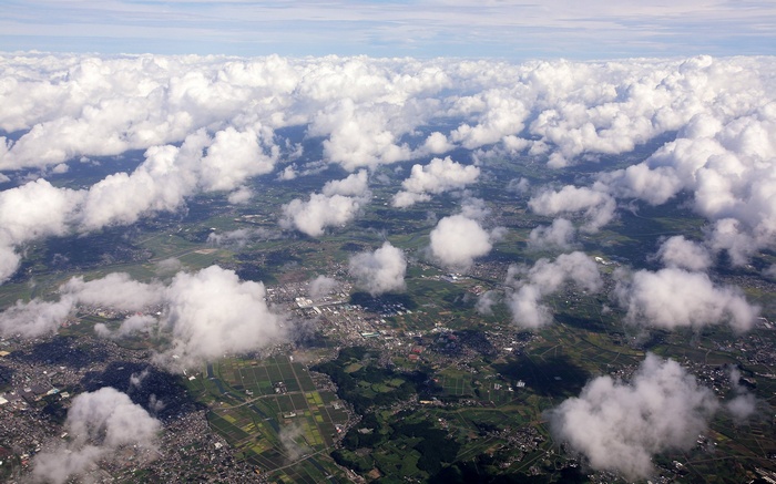 Aerial view of clouds over a landscape