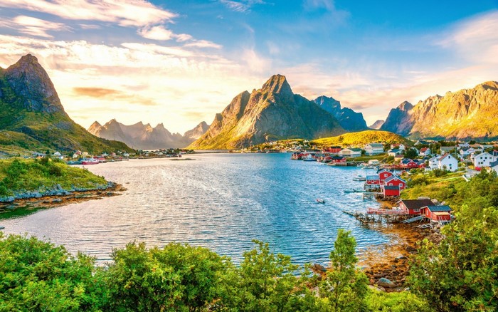 Coastal village nestled among mountains and a bay