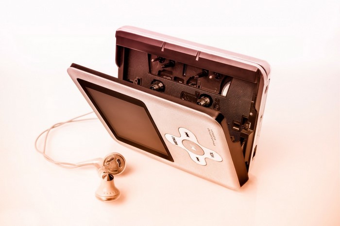 Silver portable cassette player with headphones