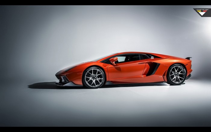 Orange Lamborghini Aventador with Vorsteiner wheels