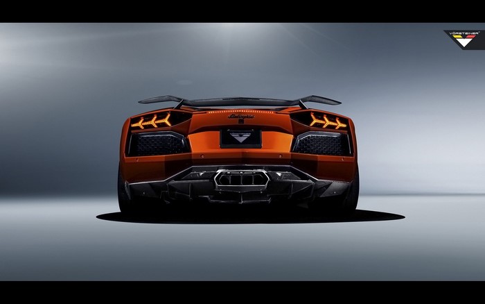 Orange Lamborghini Aventador with Vorsteiner body kit