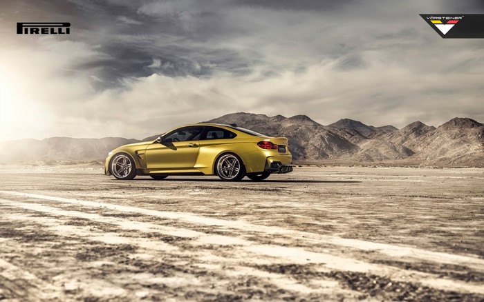 Yellow BMW M4 GTRS4 by Vorsteiner and Pirelli in desert