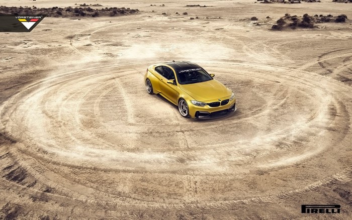 Yellow BMW M4 GTRS4 by Vorsteiner on dirt track
