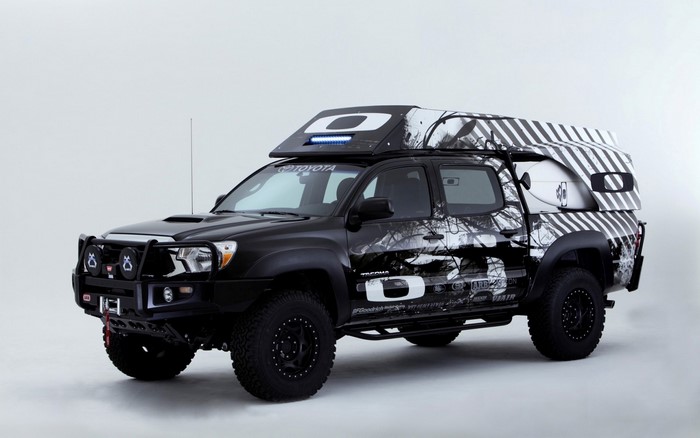 Oakley Surf Toyota Tacoma pickup truck with surfboard
