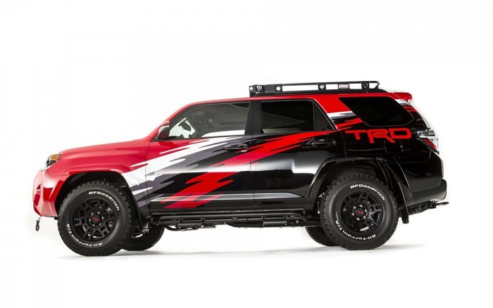 Red and black Toyota TRD 4Runner with racing stripes