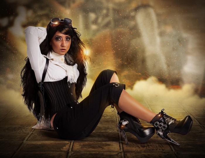 Woman in Steampunk Outfit Posing on Floor
