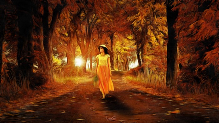 Woman walking on a path in an autumn forest
