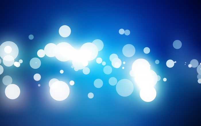 Abstract blue background with bokeh lights