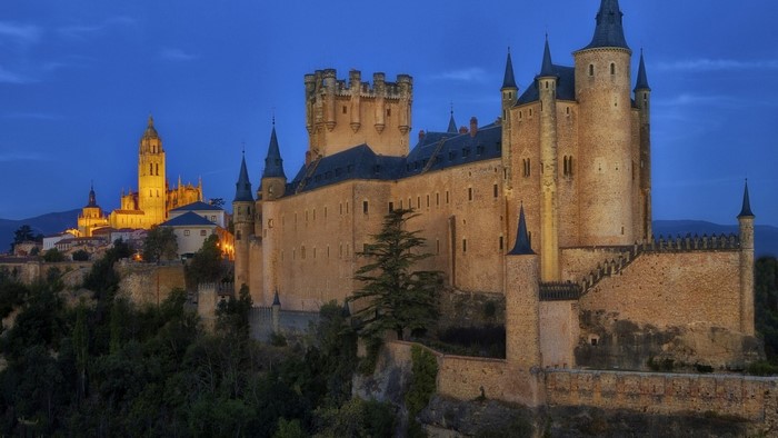 Alcázar of Segovia and Segovia Cathedral at dusk