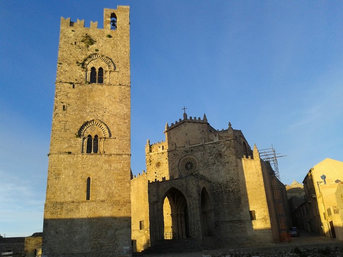 Stone bell tower and church in Erice, Sicily, Italy