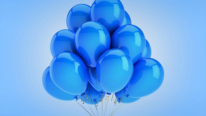 A cluster of blue balloons on a light blue background