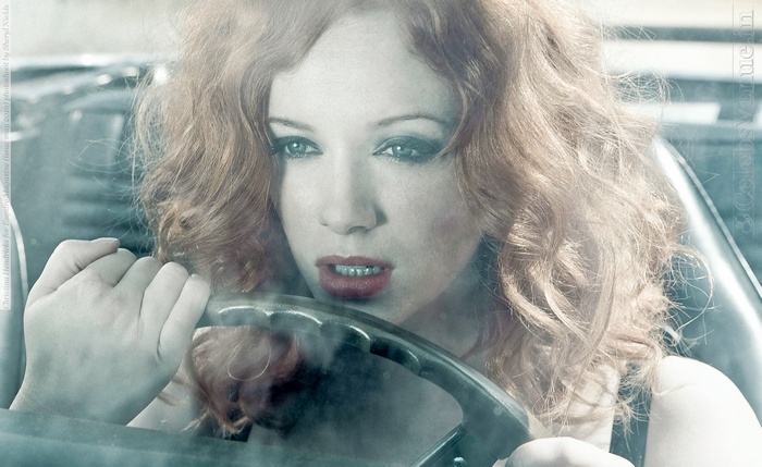 Christina Hendricks driving a car