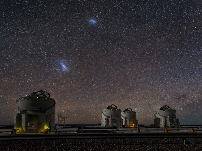 Observatory domes under a starry night sky in Atacama Desert, Chile