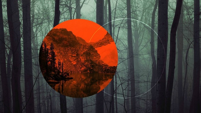 Orange circle with mountains and lake in forest