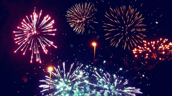 Fireworks exploding in the night sky