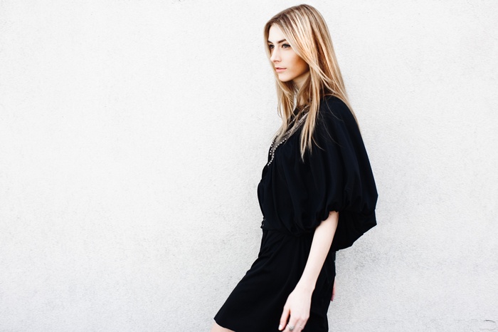 Sabina Trojanova in a black dress