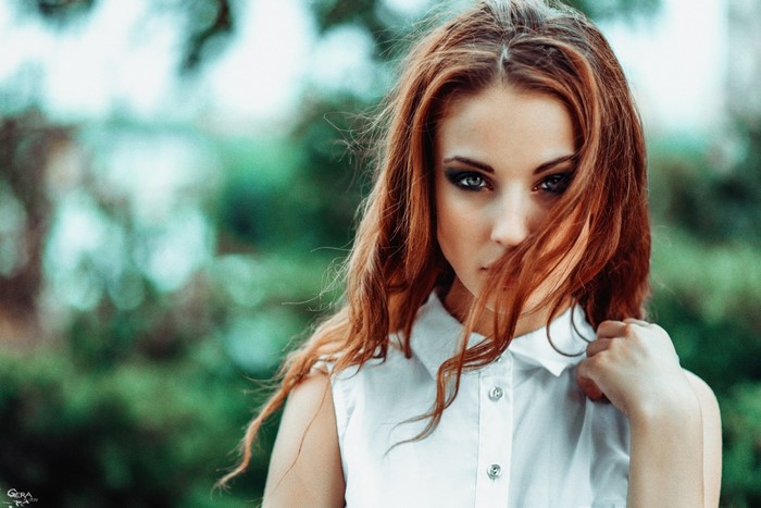 Portrait of a Redhead Woman with Intense Gaze