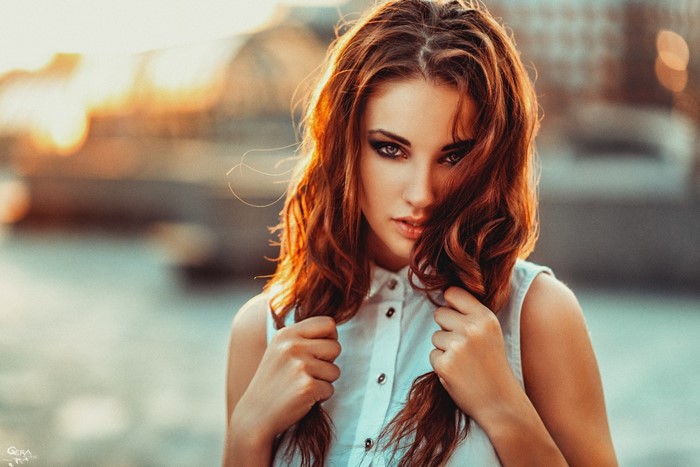 Striking Portrait of a Redhead Woman in Sunlight