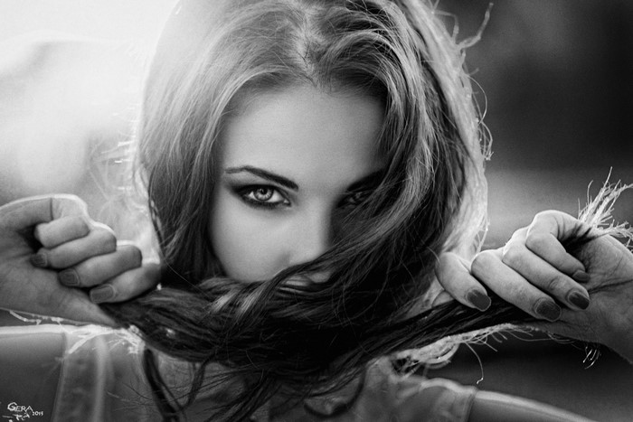 Monochrome portrait of a woman with long hair