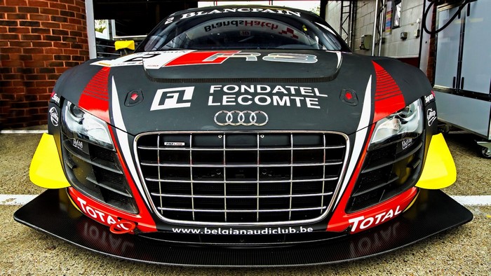 Audi R8 LMS GT3 race car with sponsors