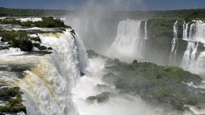 Iguazu Falls with lush green vegetation