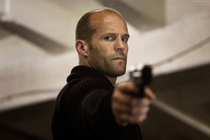 Jason Statham holding a gun