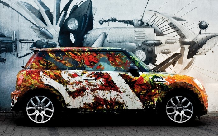 Mini Cooper covered in abstract graffiti art