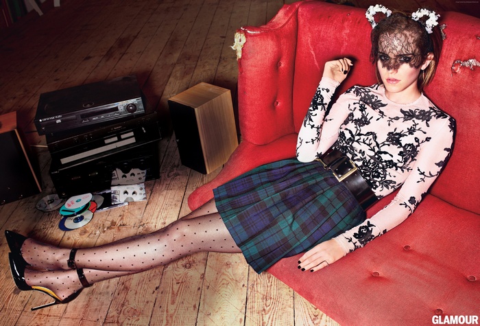 Emma Watson in a plaid skirt and polka dot tights