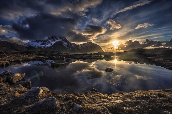 Sunset Reflection over Lofoten Mountains in Norway