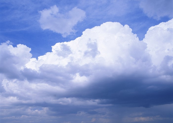 Blue sky with white and dark clouds