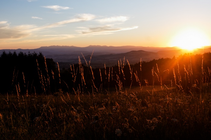 Sunset over Auvergne mountains in France