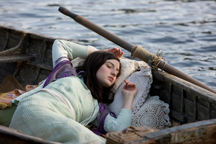 Actress María Valverde sleeping in a boat