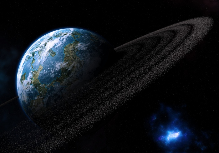 Planet with rings in outer space with nebula
