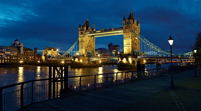Tower Bridge at night over the River Thames, London
