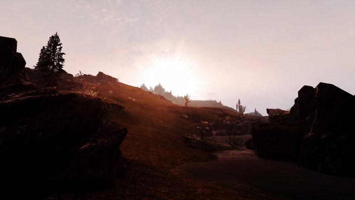 The Elder Scrolls V Skyrim landscape at sunrise