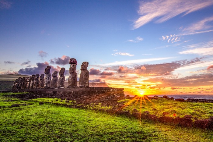 Moai statues at sunset on Easter Island, Chile