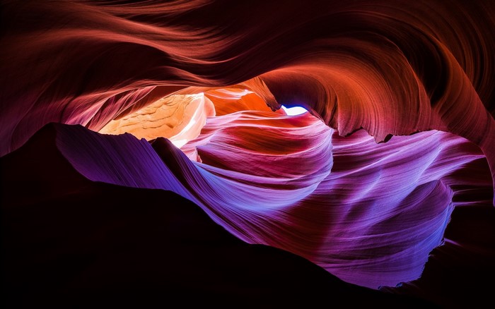 Antelope Canyon rock formations with colorful light