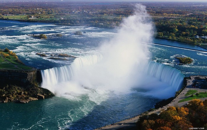 Niagara Falls with mist and surrounding landscape