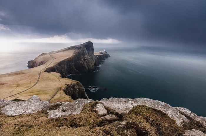 Neist Point Lighthouse, Scotland, with dramatic stormy skies