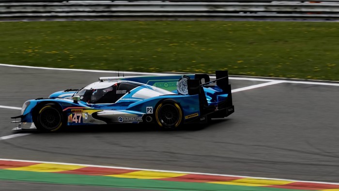 Blue and white ORECA 07 LMP2 race car on track