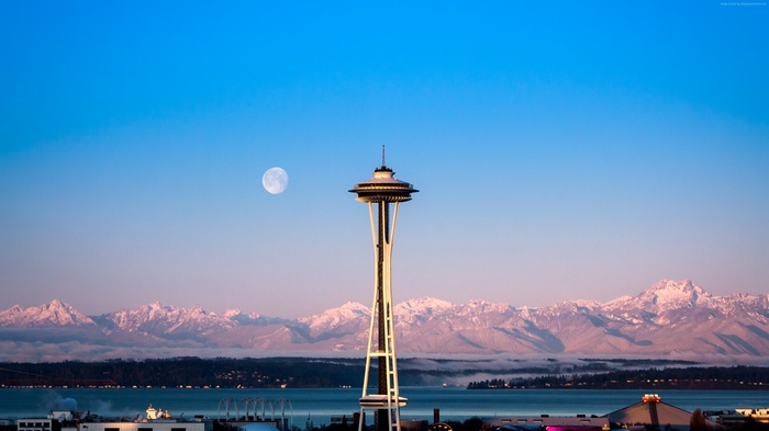 Space Needle and Moon over Seattle Mountains