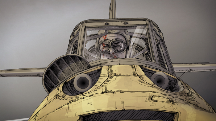 Pilot in cockpit of a vintage aircraft
