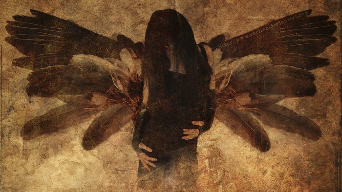 Dark angel with large wings on textured background