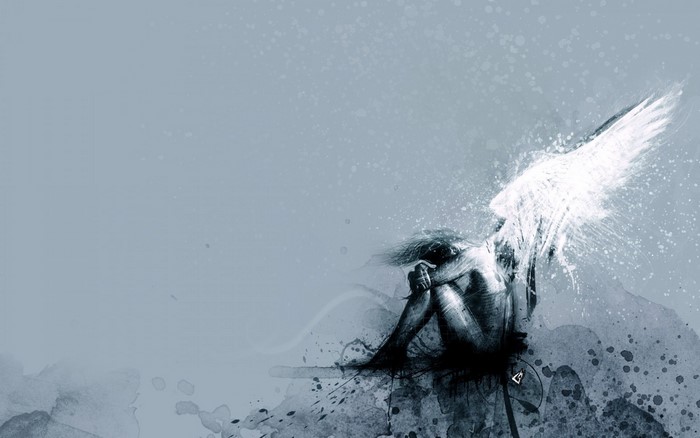 Angel sitting in the snow