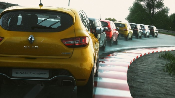 Renault Clio RS cars on a wet race track