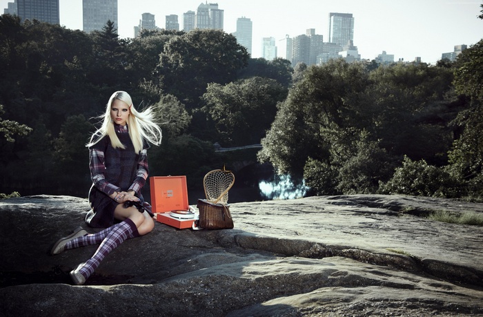 Sasha Luss with a record player in Central Park