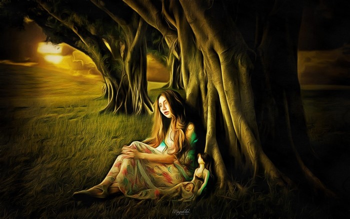 Woman and doll sitting under a large tree at sunset