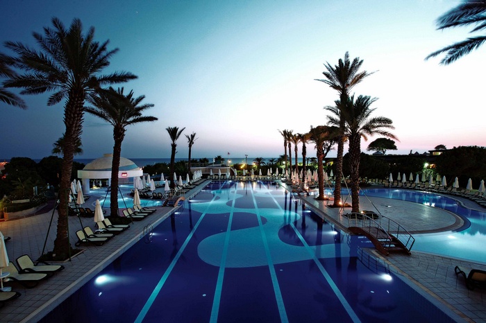 Limak Atlantis De Luxe Hotel resort pool with palm trees