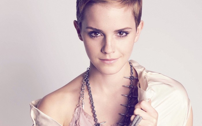 Emma Watson portrait with short hair and jewelry