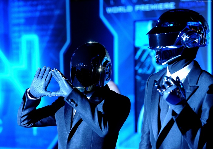 Daft Punk duo in helmets and suits